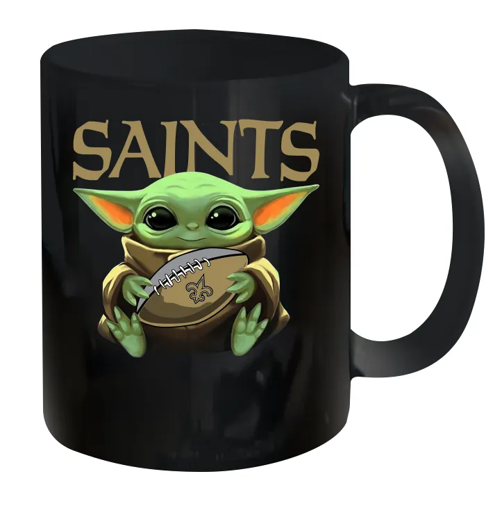 Baby Yoda Loves The New Orleans Saints Star Wars Baby Yoda Hugs Saints NFL Ceramic Mug 11oz